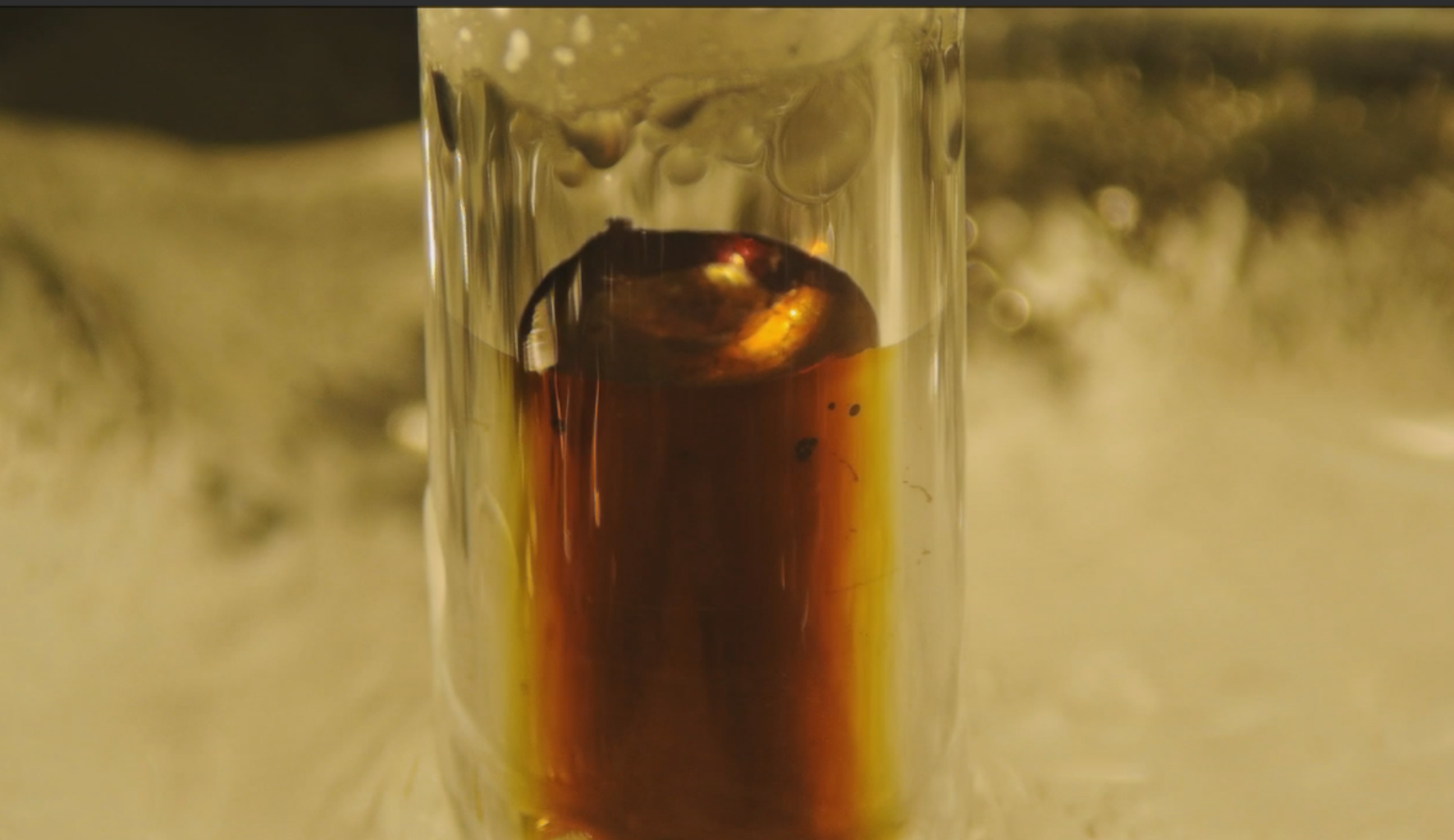 Gold colored metallic solution with higher concentration of excess electrons