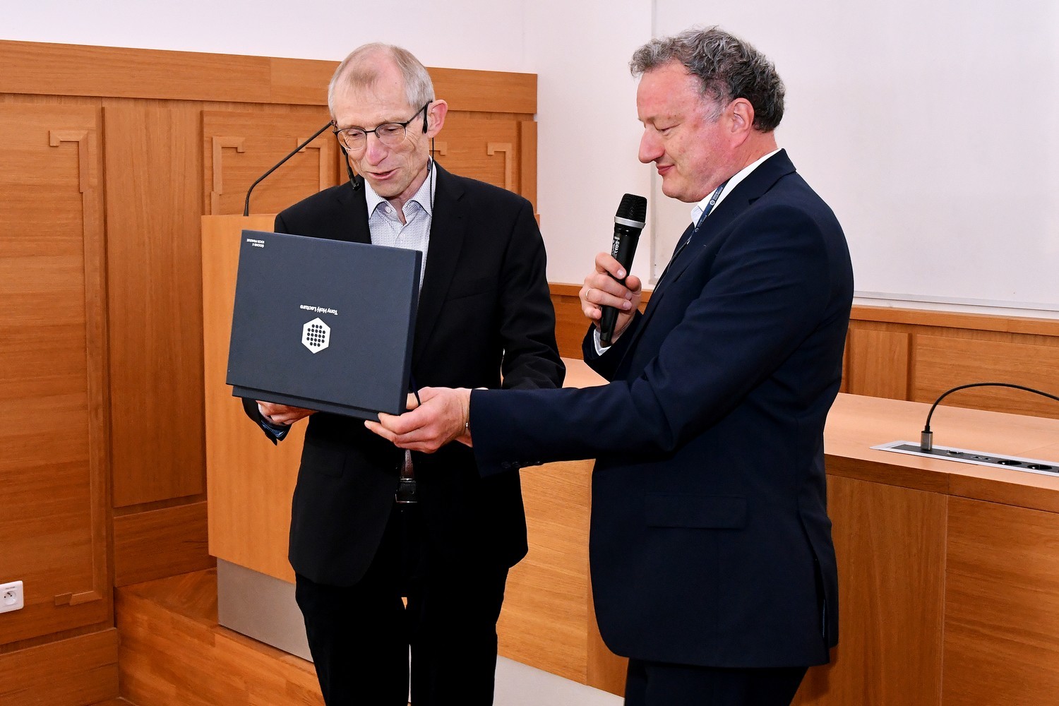 Prof. Altmann received the Tony Holý Lecture plaque